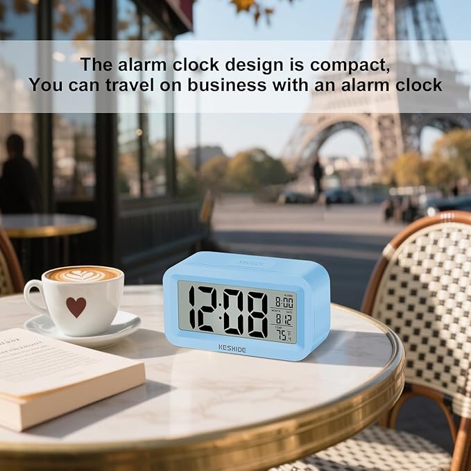KESHIDE Travel Digital Alarm Clock Battery Operated with Indoor Temperature, Desk Small Clock,Snooze Model,12/24H Display for Bedrooms Heavy Sleepers Kids Travel Bathroom (Black)