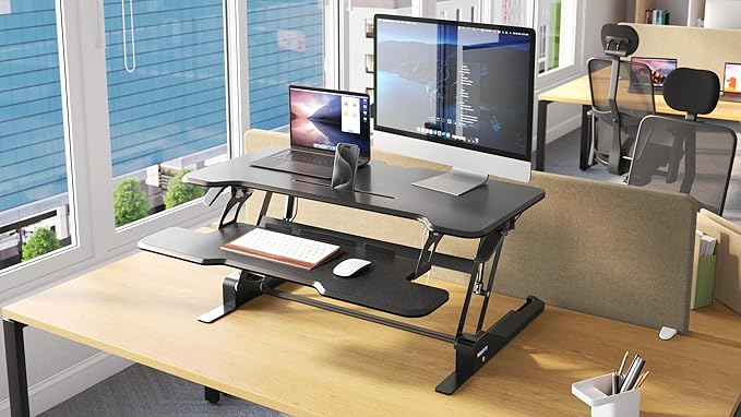 Mount-It! 38" Standing Desk Converter, Desktop Sit-Stand Desk Riser with Gas Spring Height Adjustment, Compact Desk Topper for Dual Monitors or Laptop, Keyboard Tray, Black